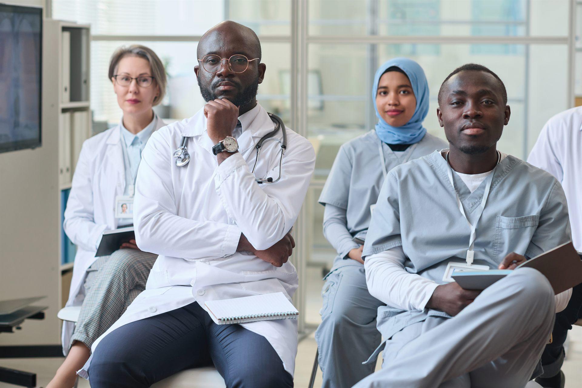 Medical professionals conferring in a modern clinic
